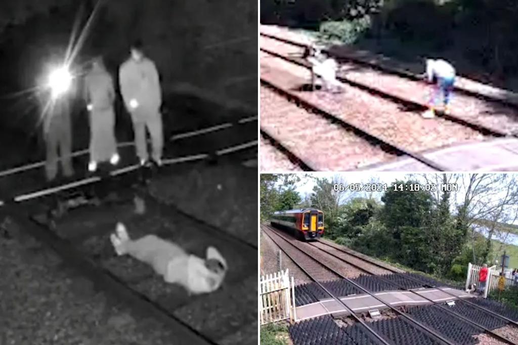Brainless fools risk their lives to pose for photos on railroad tracks